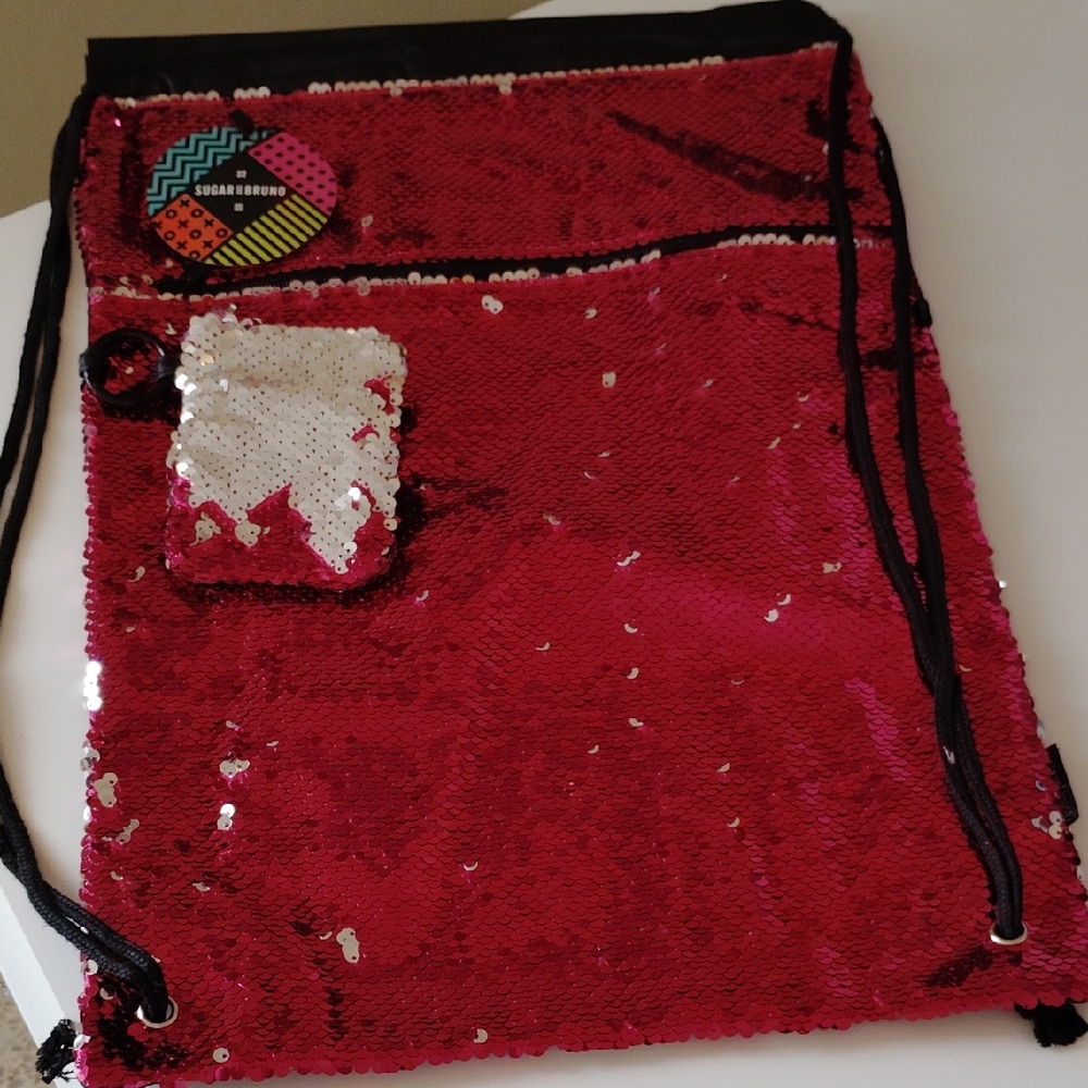 Sugar & Bruno Pink And Silver Sequin Backpack.